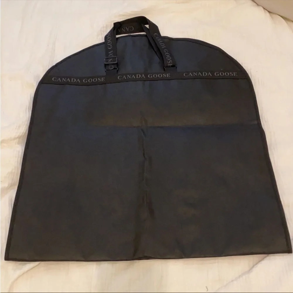 Canada Goose coat black dust bag . New.